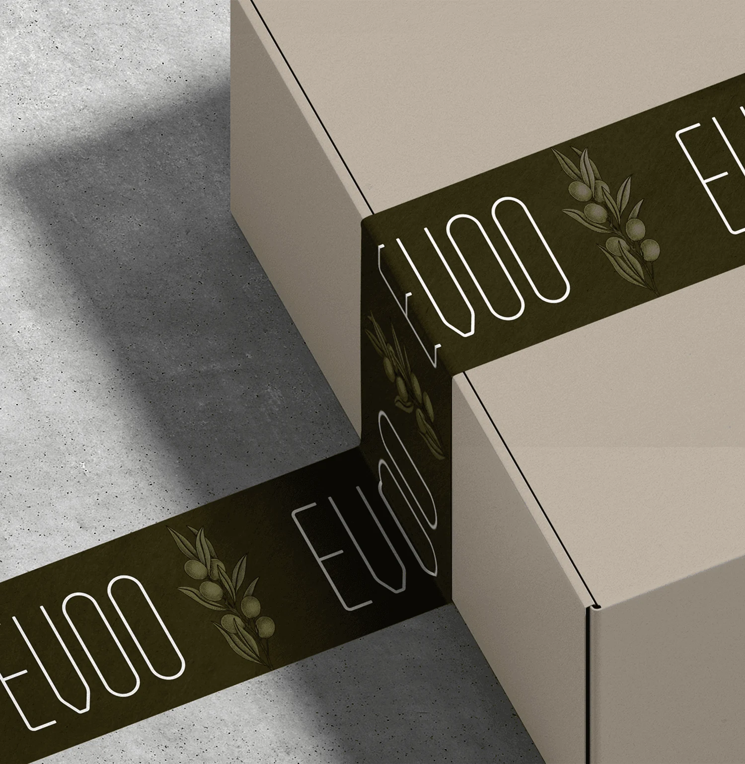 EVOO takeaway packaging system with gold foil logo and olive-toned wraps