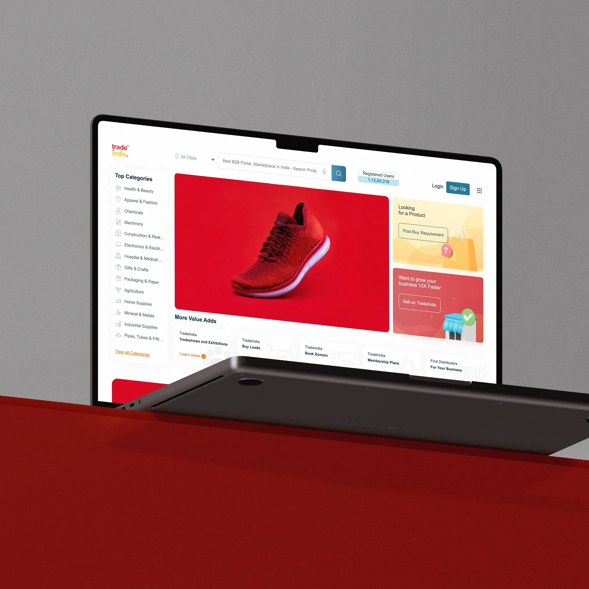 Trade India mobile-first marketplace interface shown on a laptop screen with search and product listing layout